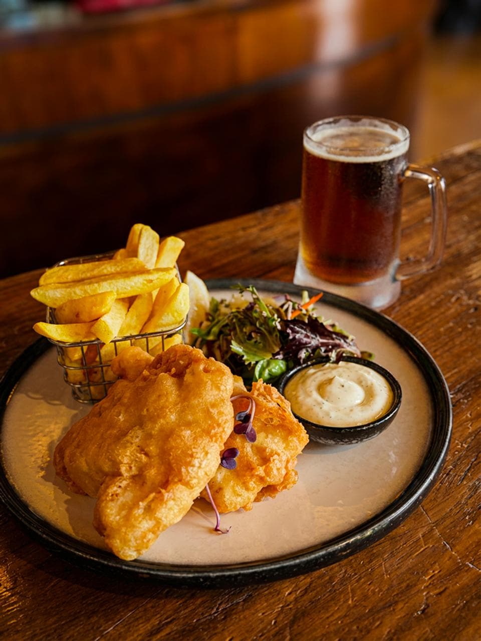 Fresh fish and chips platter at Stampede Bar and Grill